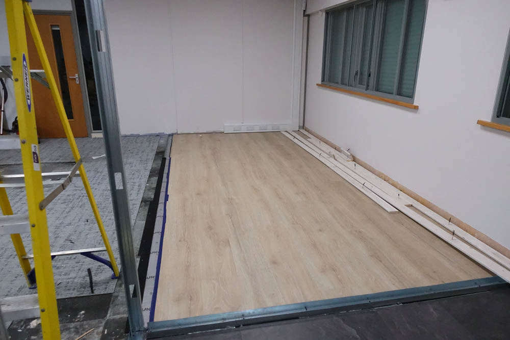 The wooden flooring for the main lounge
