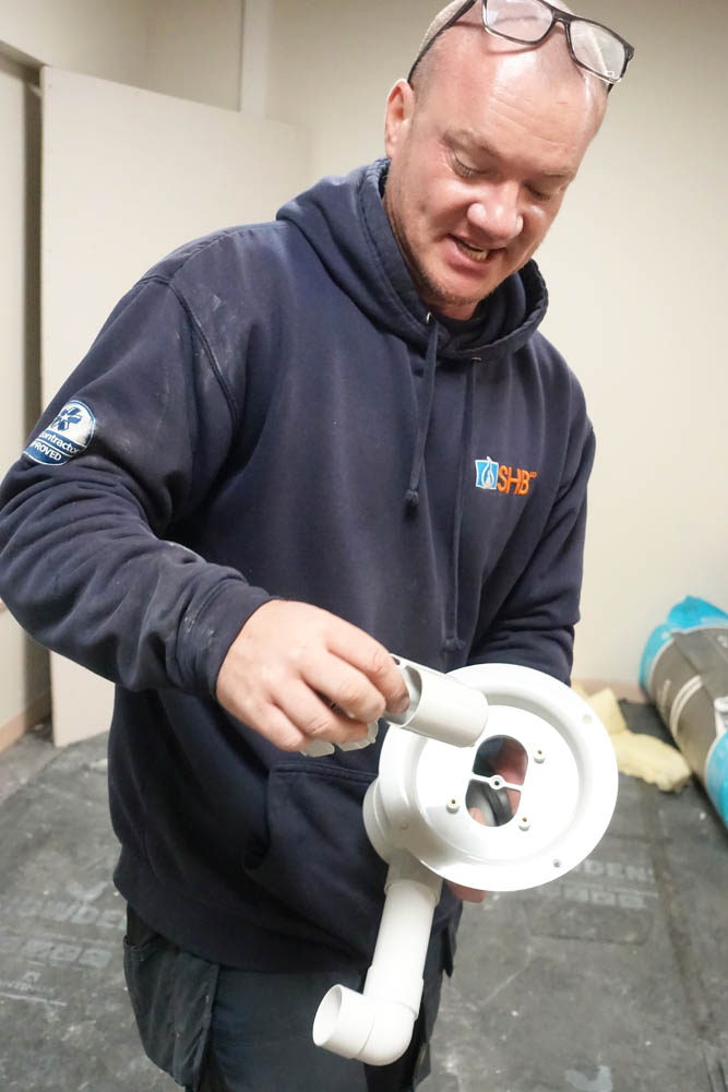 James enthusiastically demonstrates the sublime intricacies of the combined hair and sediment trap