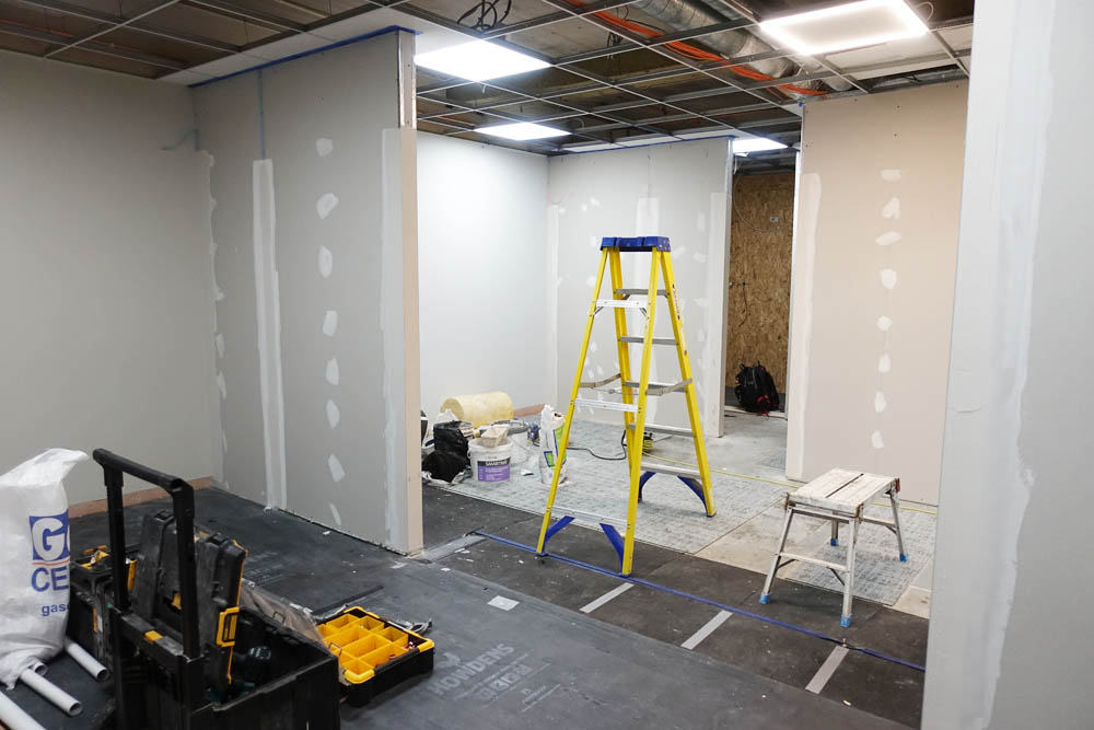 Looking from the sauna to the vanity, changing and shower areas - clearly not yet finished; 'lick a paint, lick a paint, lick a paint, one hour, easy!'