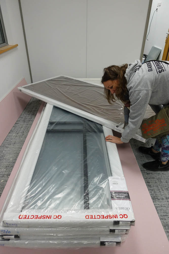 Emma casting an eagle-eye over the newly arrived doors