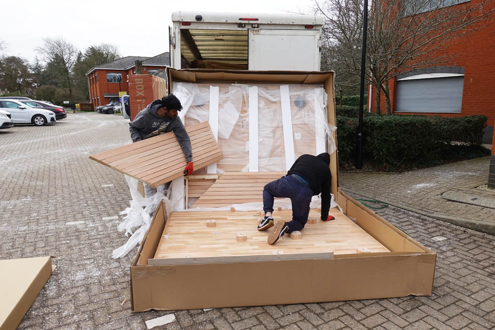 The unpacking commenced outside