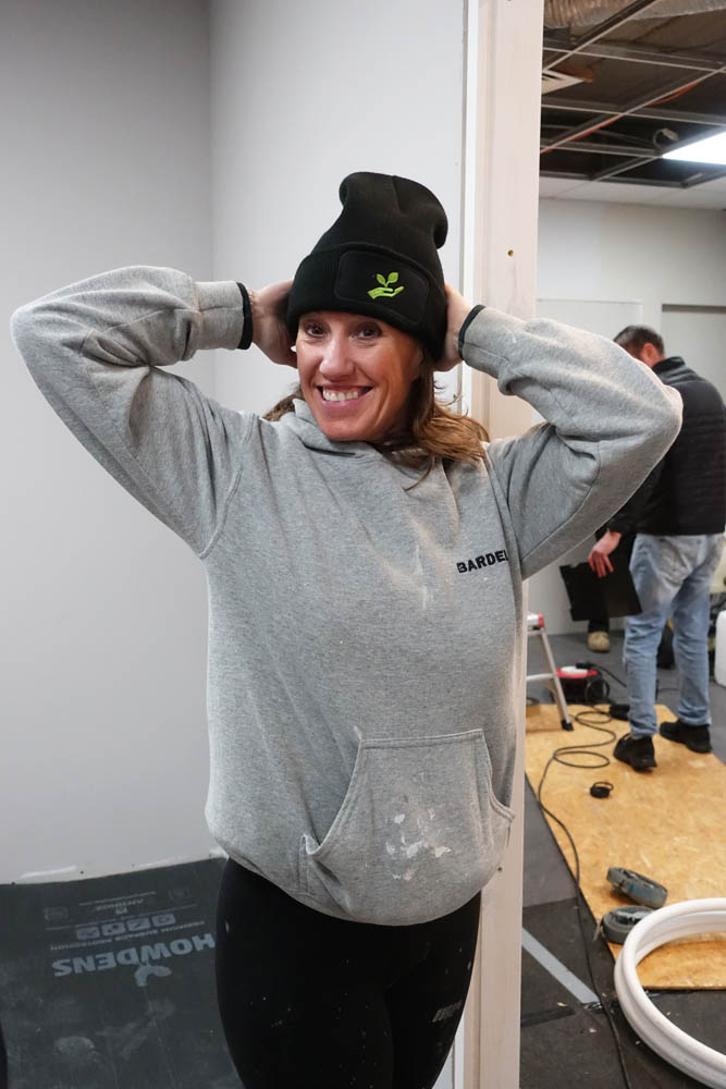 Emma styling our branded beanie hats