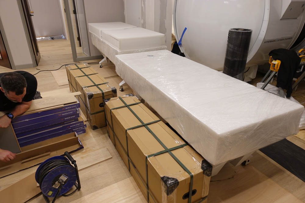 The beds are lined up, ready to be unpacked and moved into their rooms
