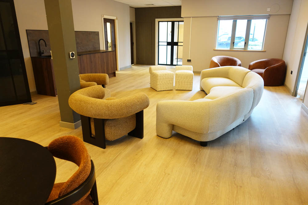 We just decided to throw the furniture on the floor and see what it looked like - There's no rugs or coffee tables or low-level lighting yet, but you get the idea!