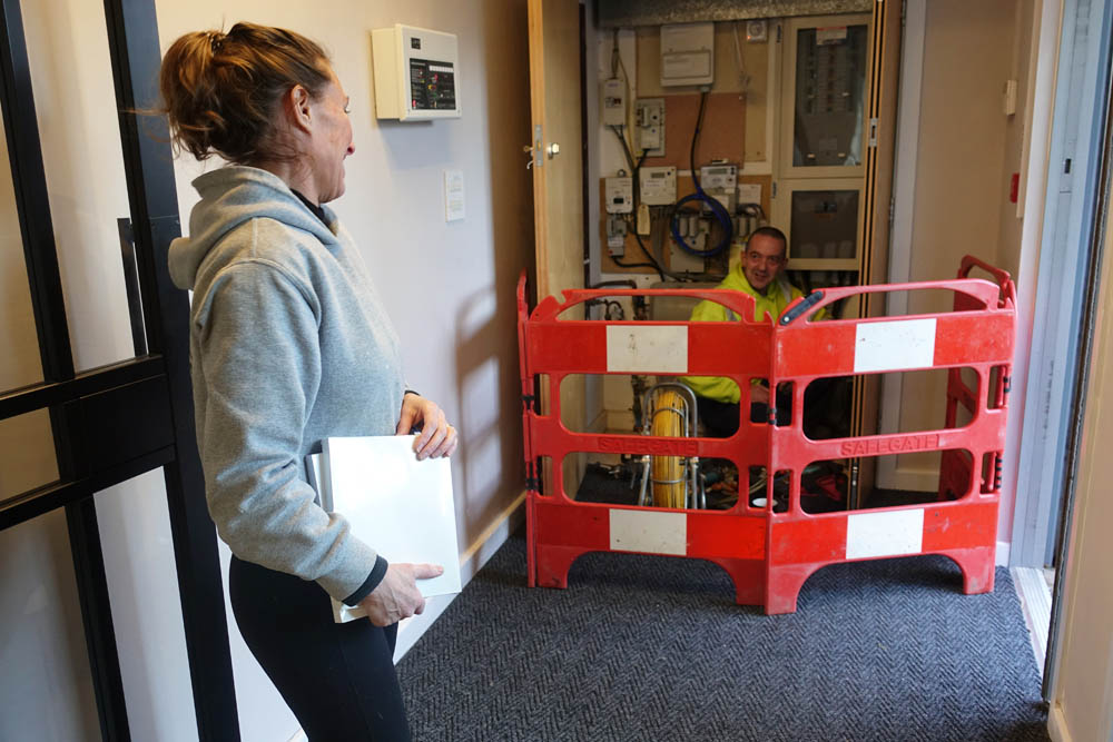 Safety first! Ian from BT/Openreach/Kelly Communications (take your pick), ensconced in his safety-first enclosure