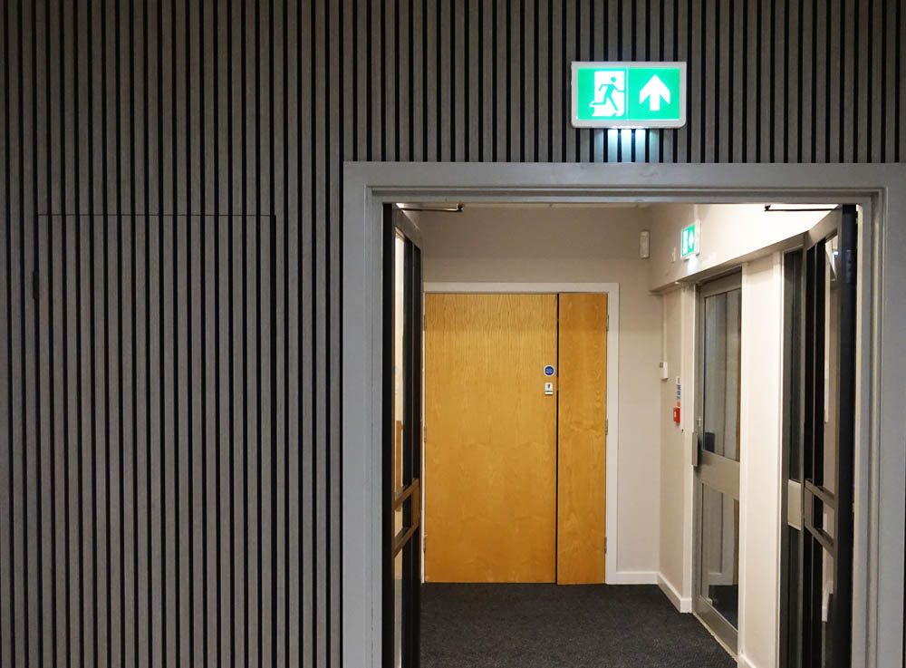 We are now all sorted with the emergency exit signs and lights - wasn't Schwarzenegger the running man? (don't worry, the electrical cupboard door will be stained Walnut.)