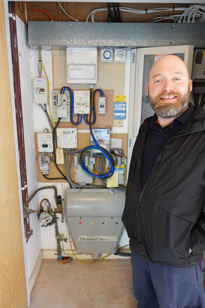 Jacob from IMServ happy with the symmetry and overall look of the electricity meter install