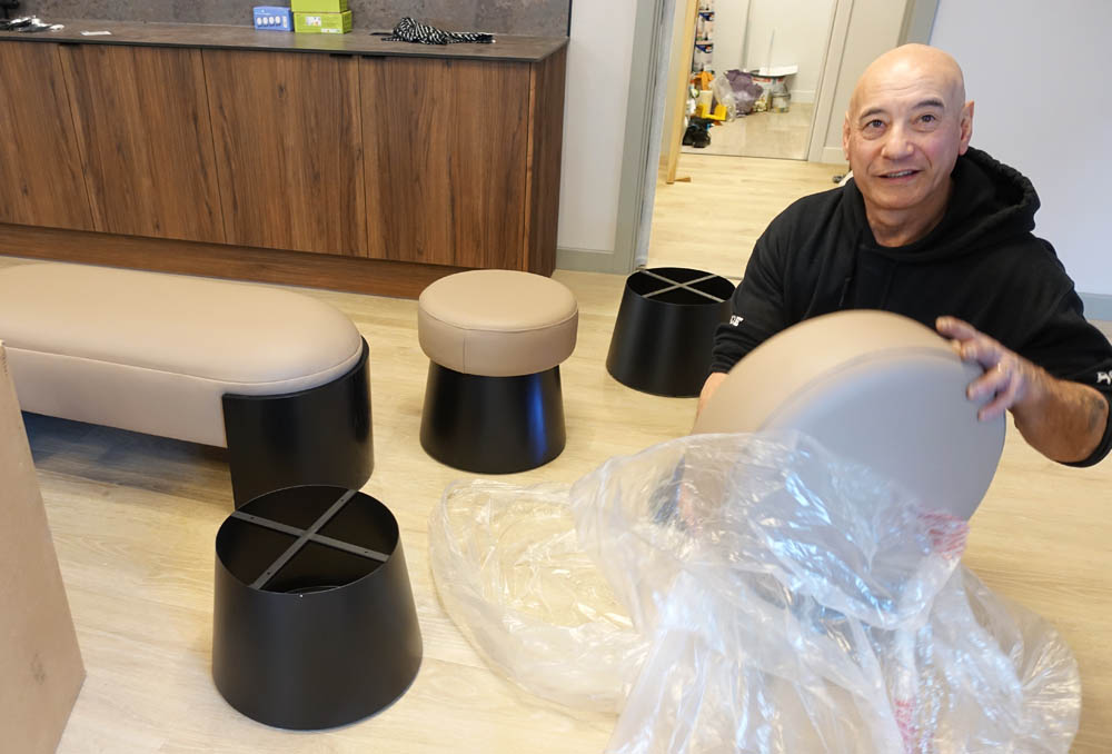 Will, the very talented upholsterer, delivered the bench and stools for the changing area - very wide stools they are and all