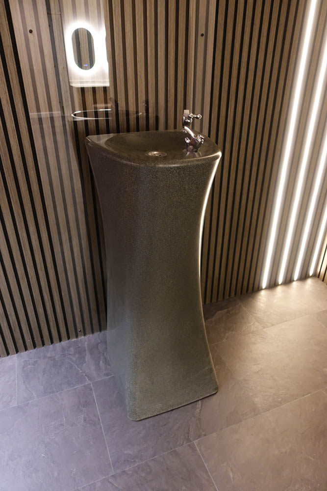 Our sexy water fountain abutting the floor-to-ceiling acrylic splash-back - just in case