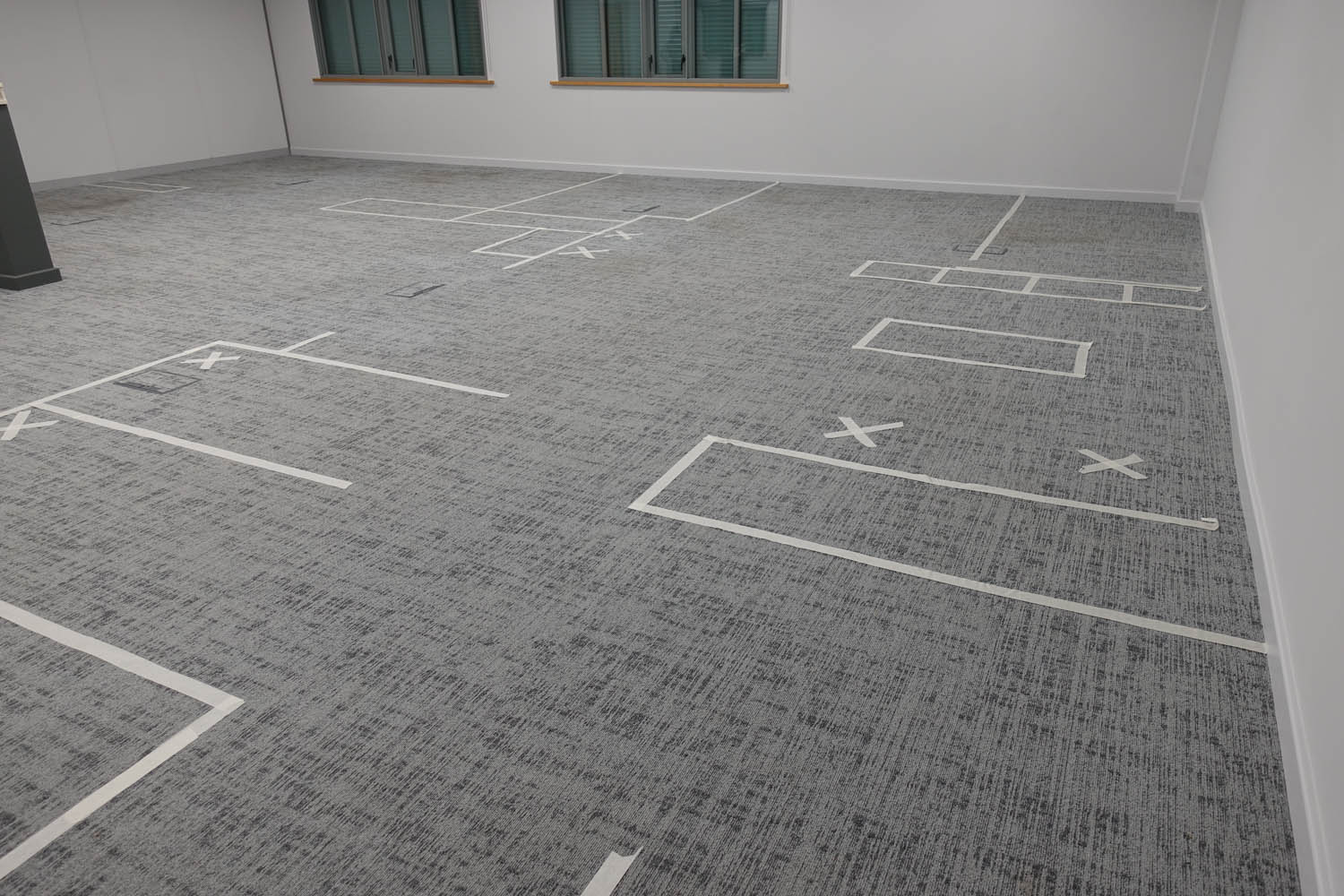Masking tape on floor to visualise layout
