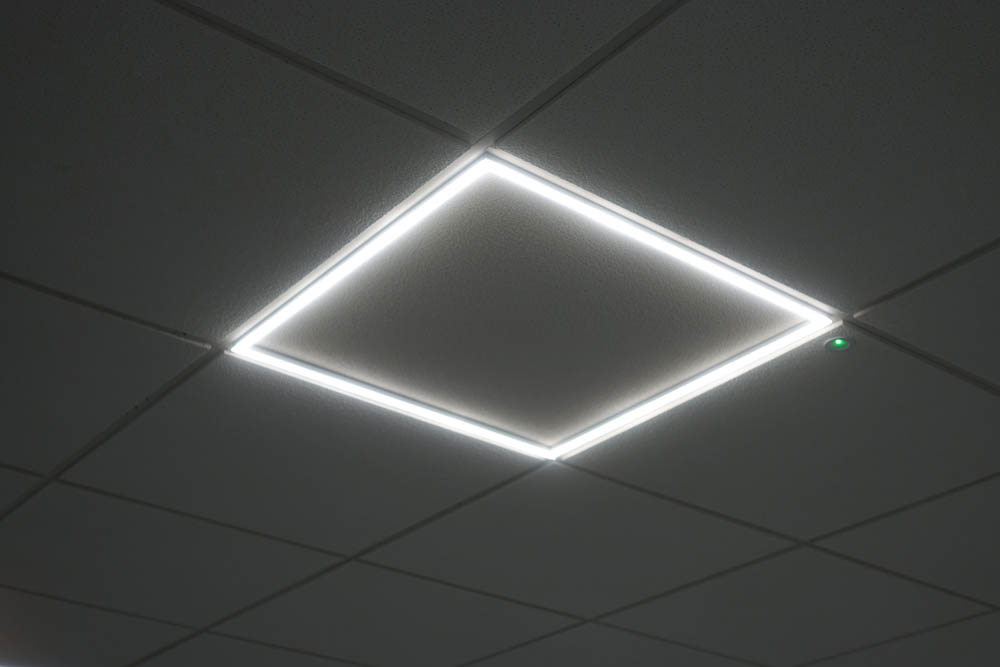 Suspended ceiling edge illuminated panel
